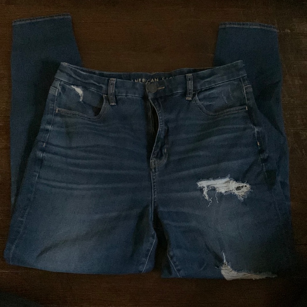 American Eagle Outfitters Blue ripped jeans.